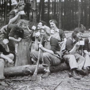 vintage photo of WWI women holding axes